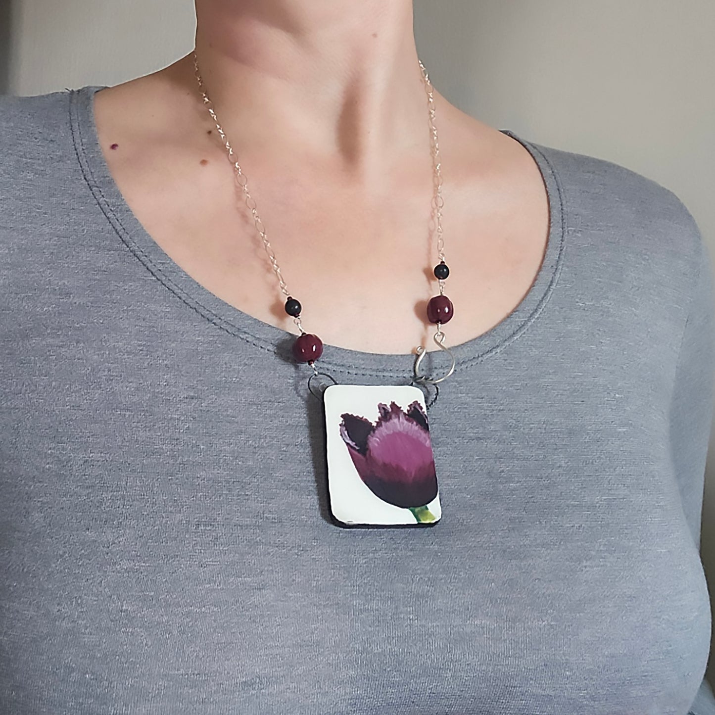 Large Tulip Necklace in Burgundy on model.