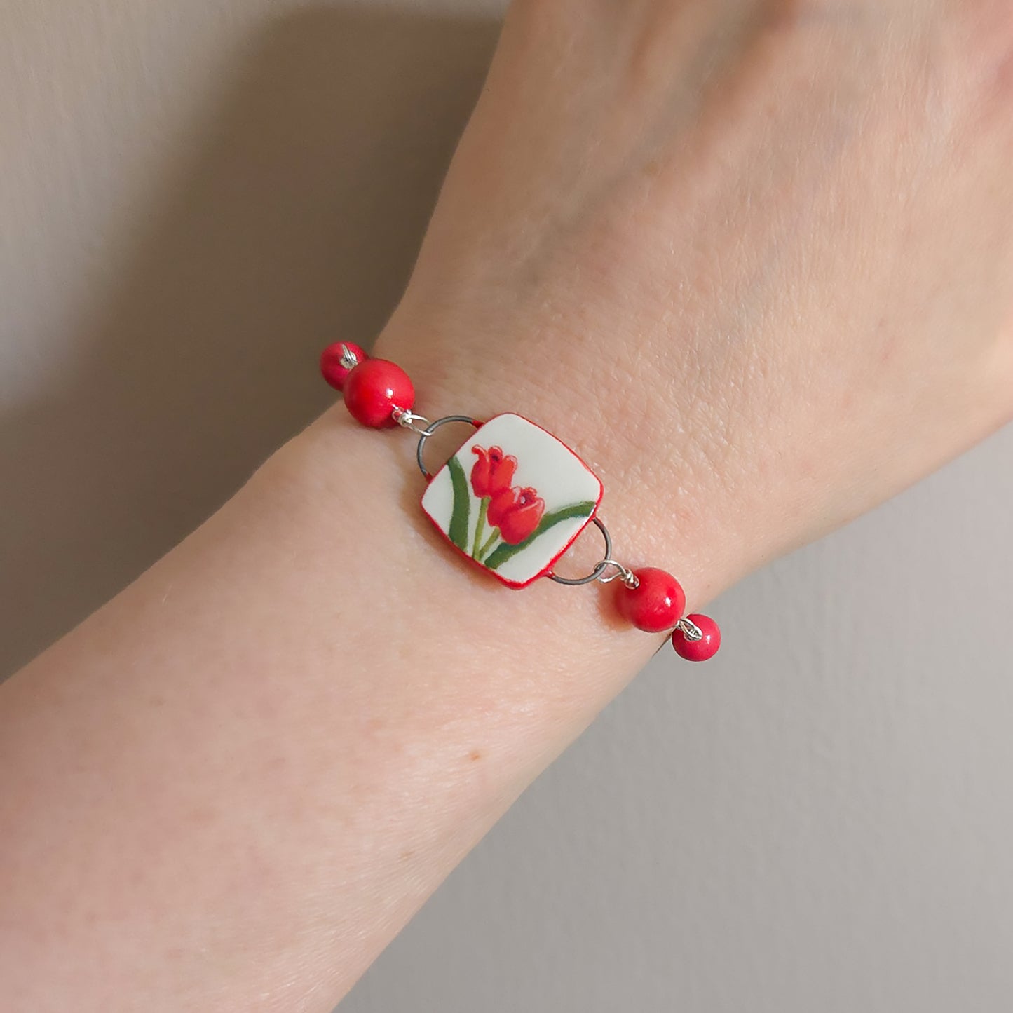 Square Tulip Bracelet in Red on model.